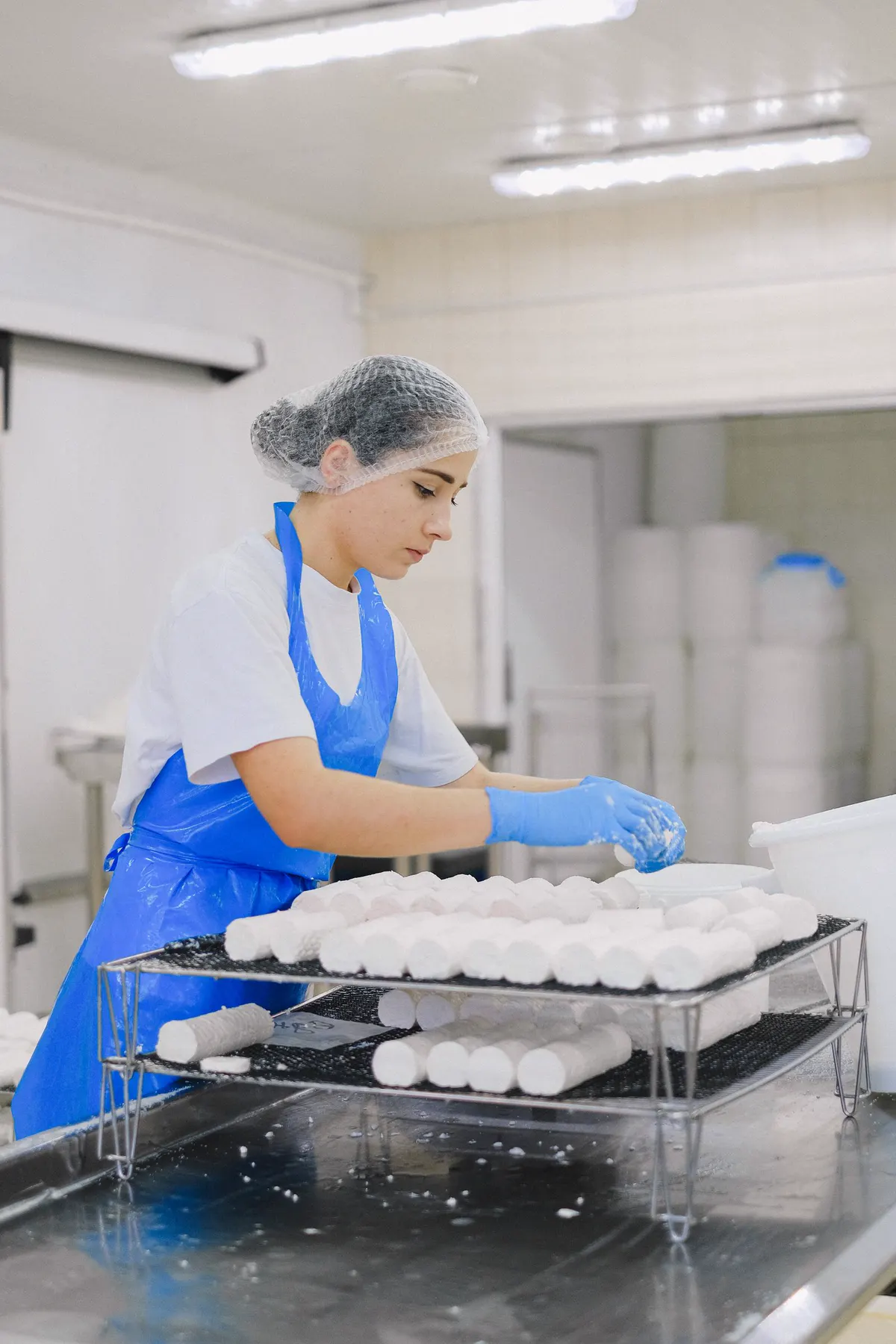 Operator working on a dairy production line